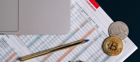 Financial spreadsheet and owner statement data on a laptop